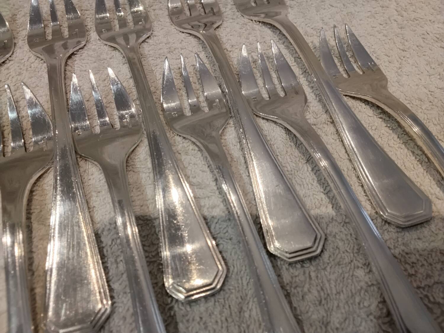 12 silver-plated oyster forks by Christofle America