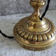 Adjustable brass desk lamp with frosted glass tulip