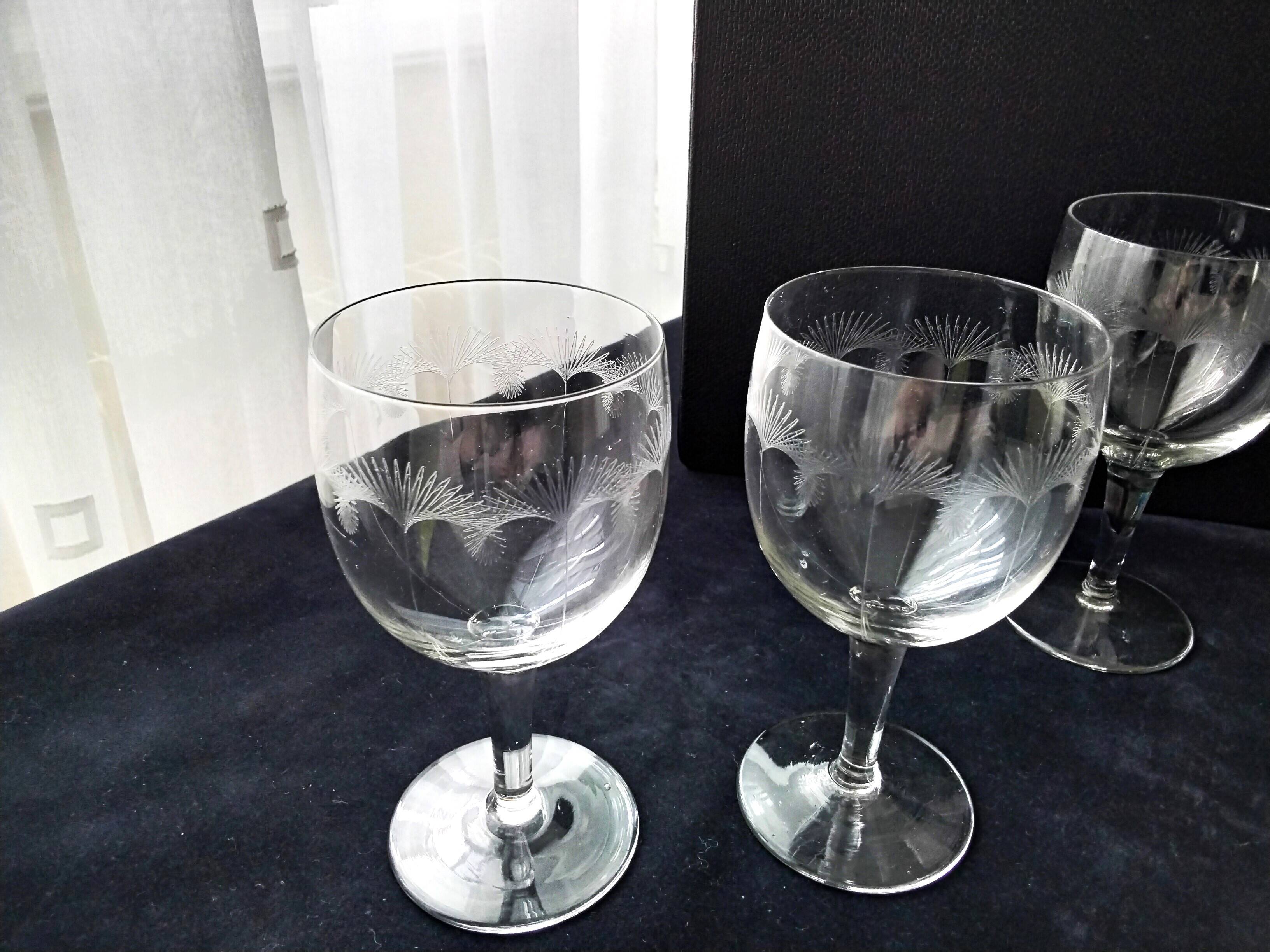 4 Antique stemmed glasses with ground decoration