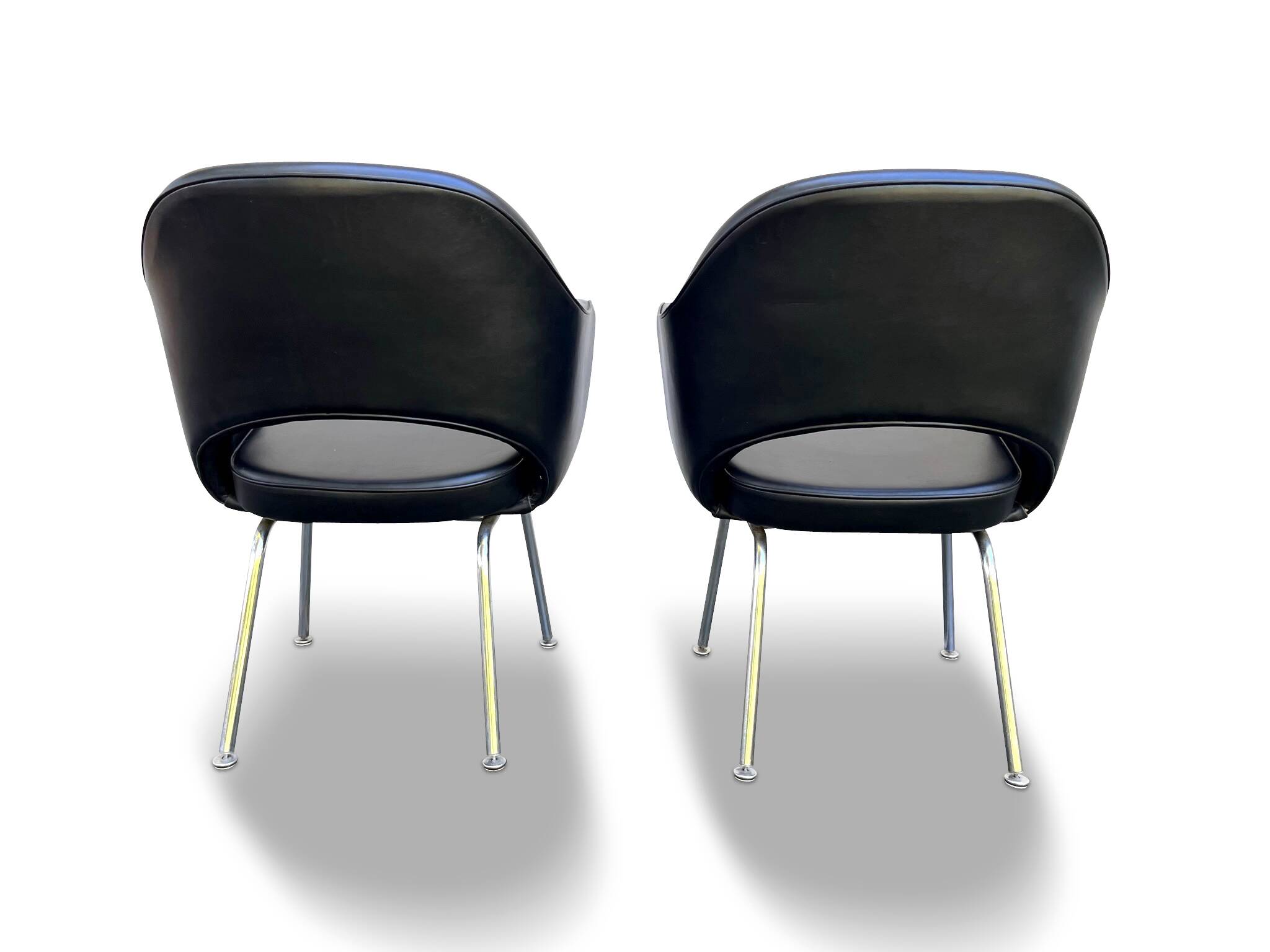 Pair of "Conference" armchairs by Eero Saarinen for Knoll International, black and chrome