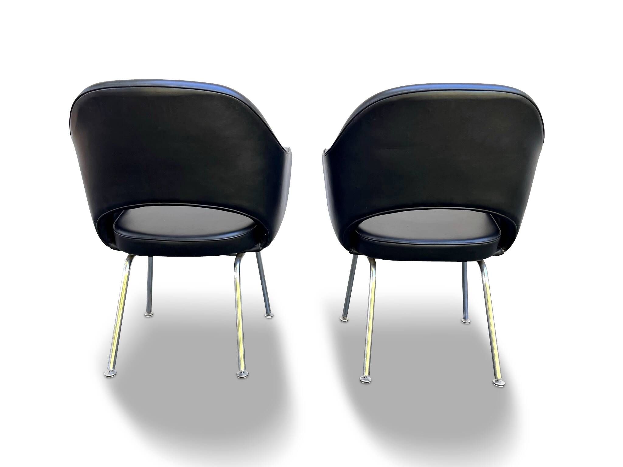 Pair of "Conference" armchairs by Eero Saarinen for Knoll International, black and chrome