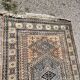 Antique Persian carpet made of wool.