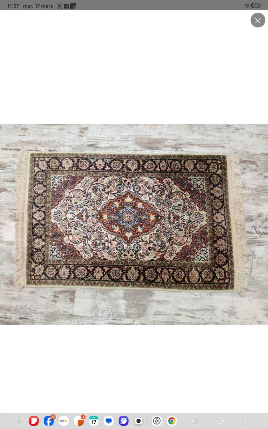 Handmade Persian carpet in wool and silk.