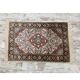 Handmade Persian carpet in wool and silk.