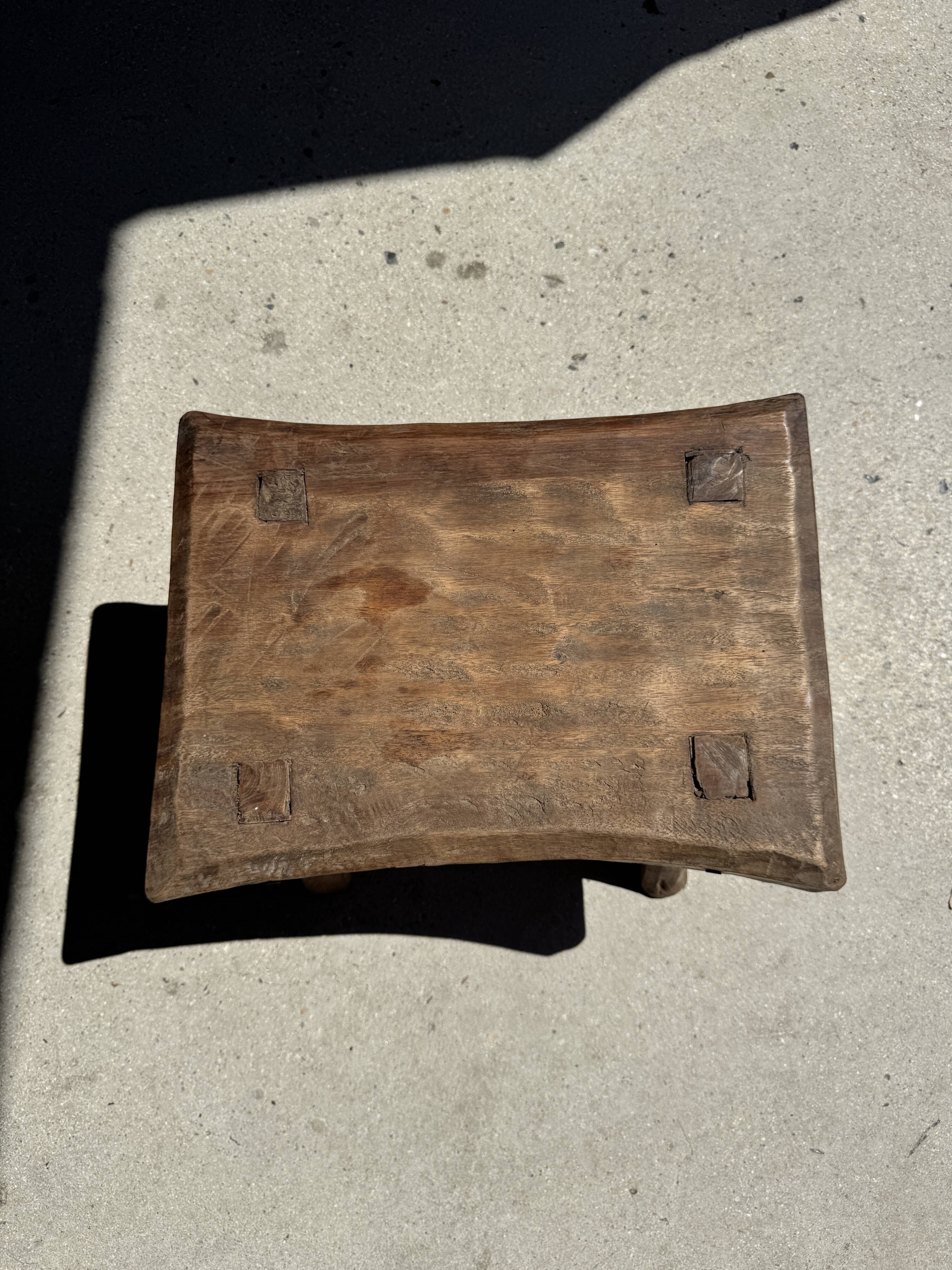 Small stool, rectangular curved accent stool in solid teak.