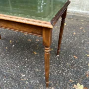 English Regency style coffee table in green leather with gilding and glass from the 1960s.