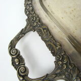 Plate with handle in silver metal
