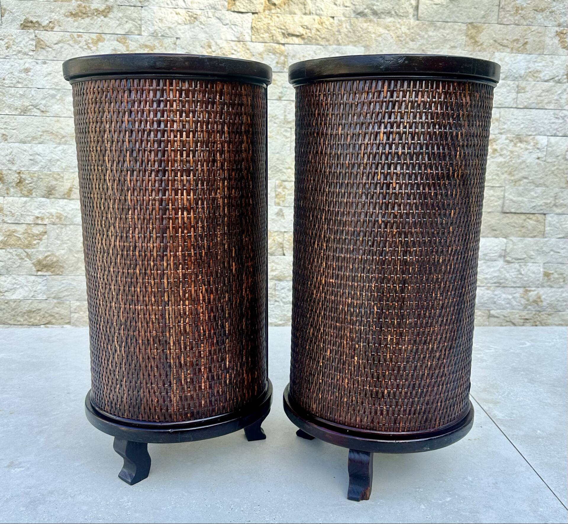 Pair of cylindrical bedside tables or drum bedside tables in exotic wood.