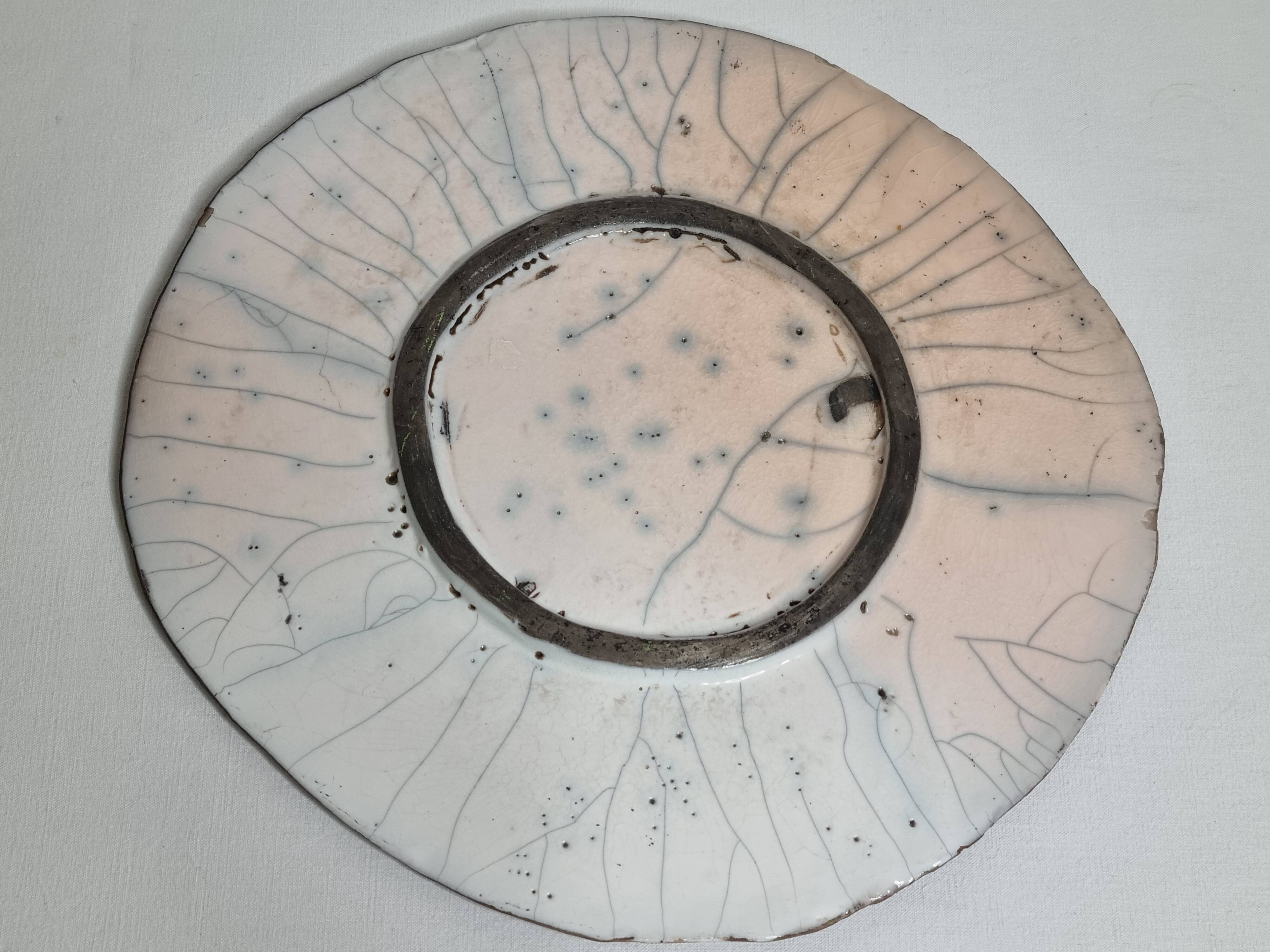 Raku ceramic presentation dish with abstract decoration, 31 cm