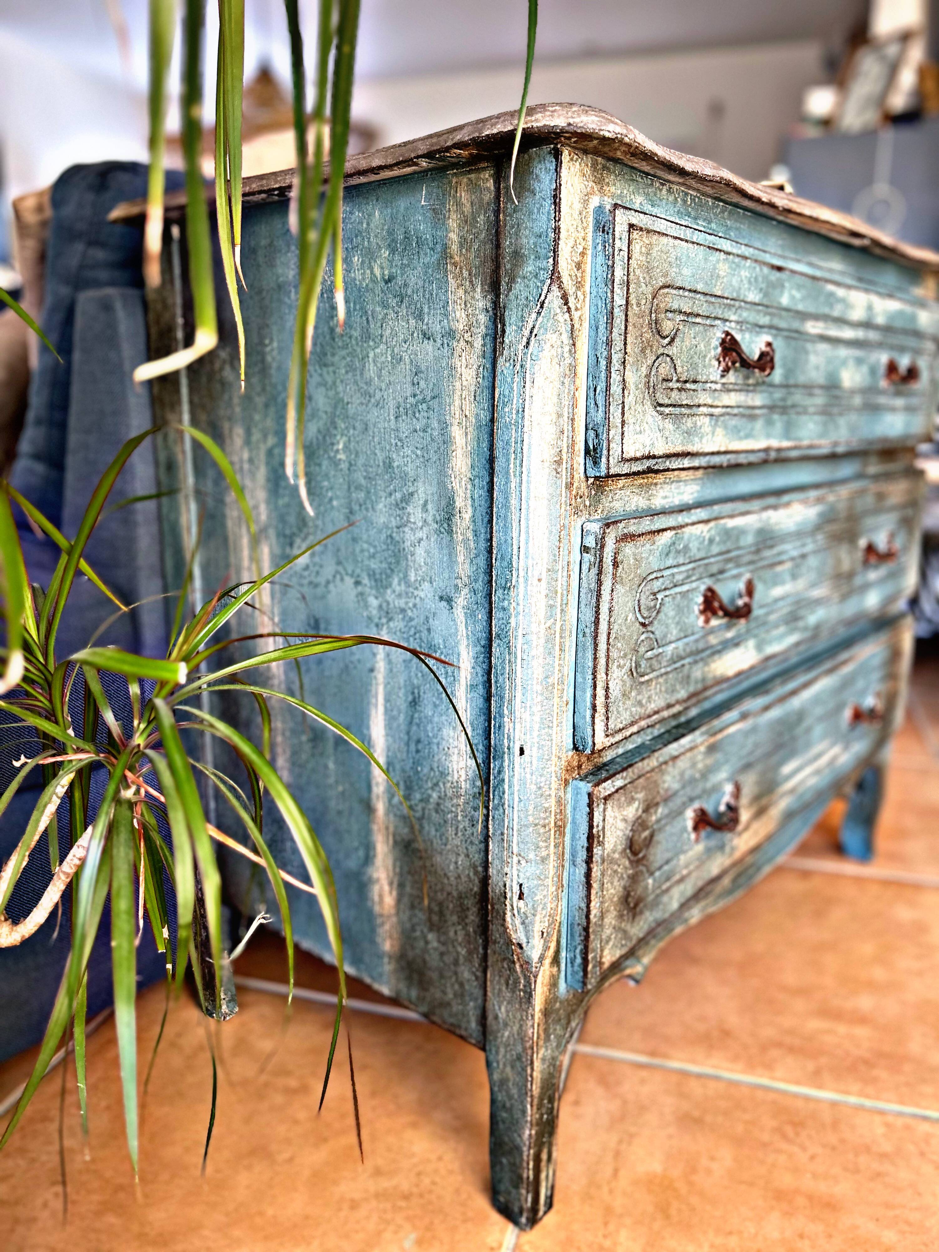 Antique commode with a patina in the Tuscan technique.