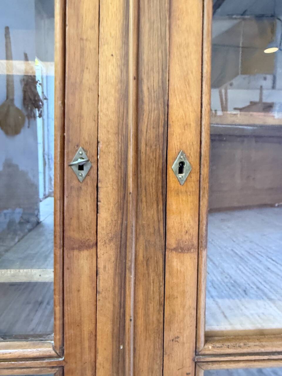 Glass-fronted walnut library 1900