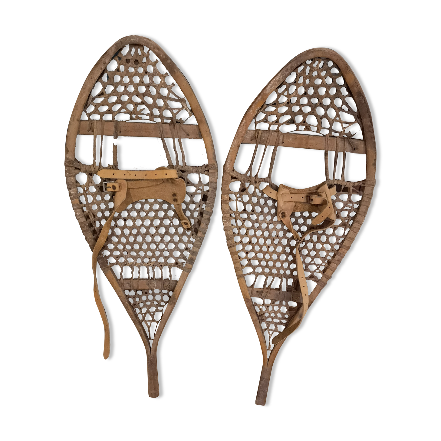 Pair of old snowshoes in wood, leather, and natural gut string