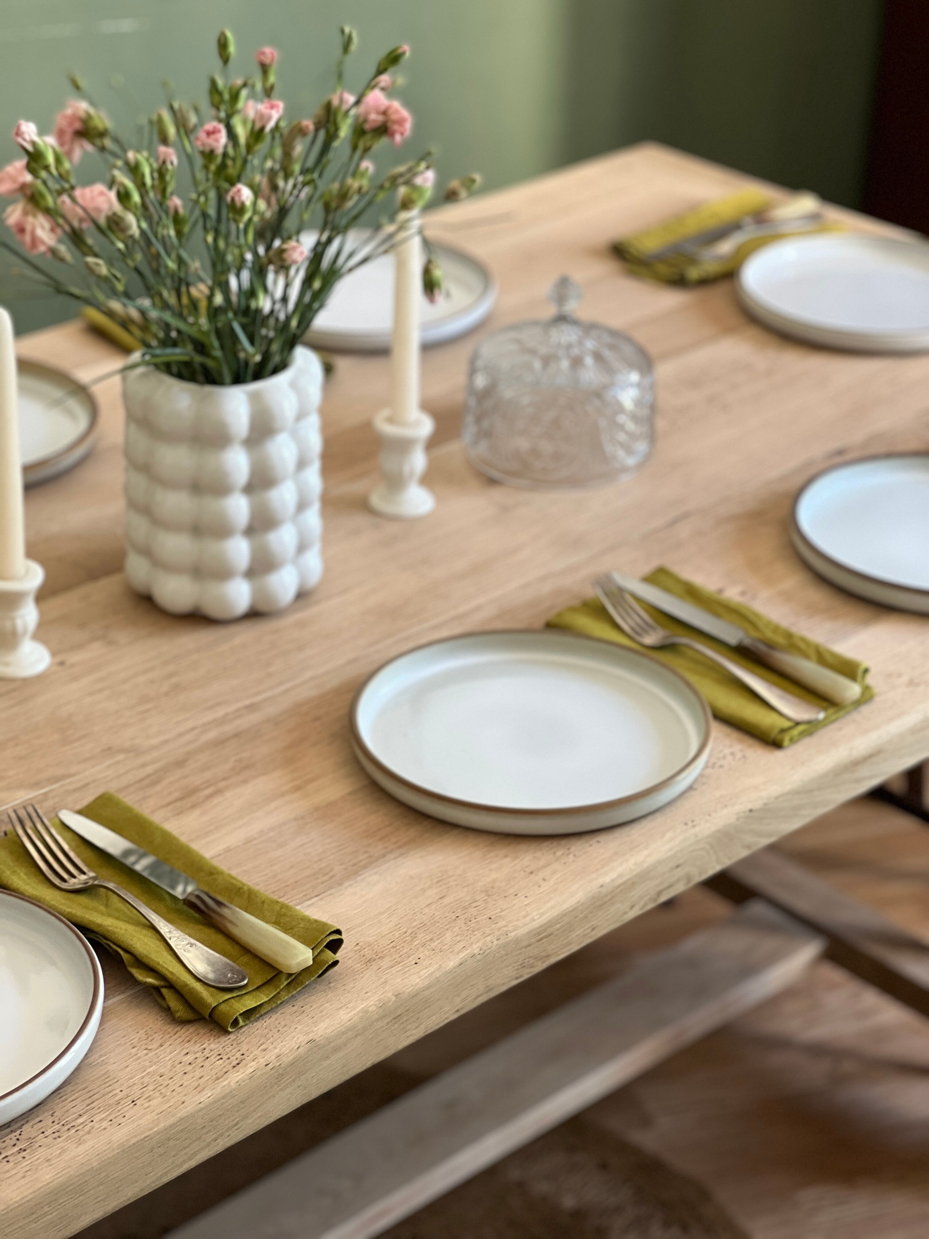 Farm table made of solid light oak wood.