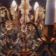 Chandelier cage with grapevines 8 lights Louis XV style in bronze and crystal around 1900
