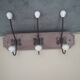 Wall coat rack in wood and porcelain