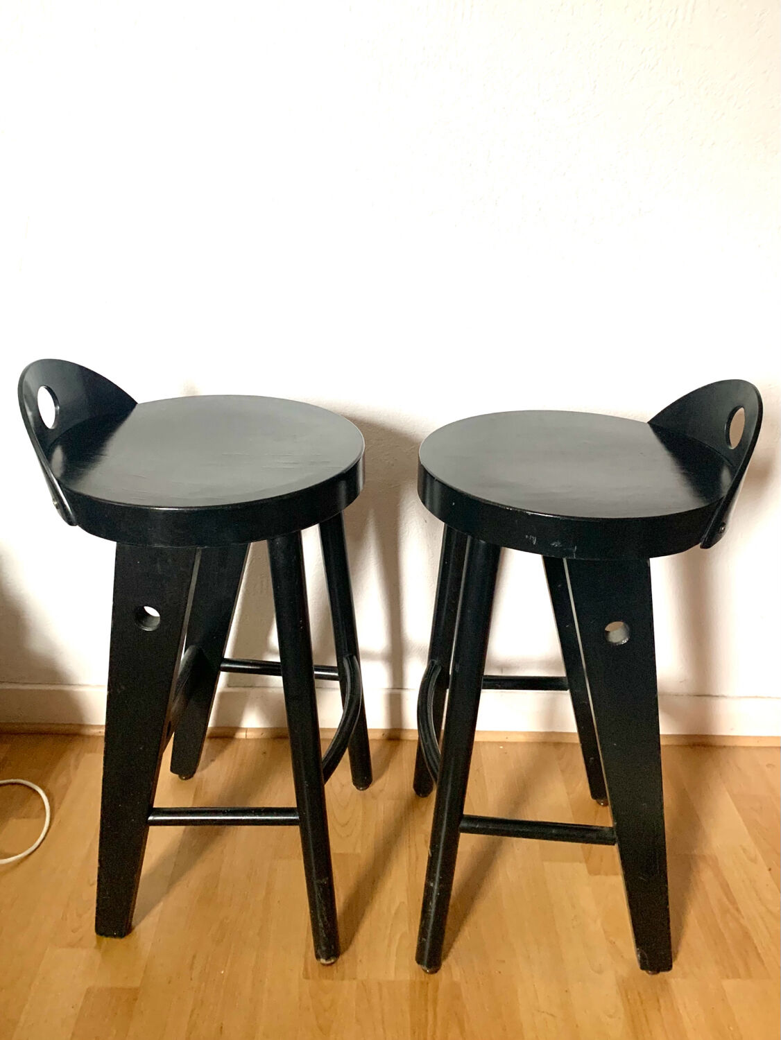 Pair of black designer stools by Baumann
