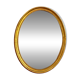 Deknudt oval gold frame mirror.
