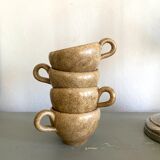 Four ceramic cups