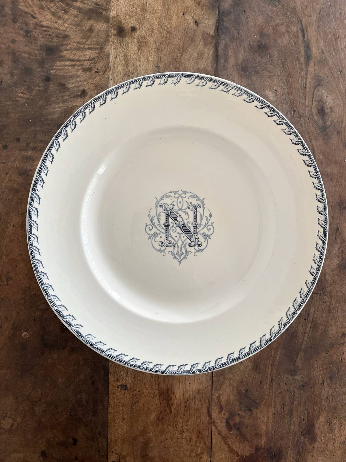 Round iron earth dish monogram “N” KG Lunéville