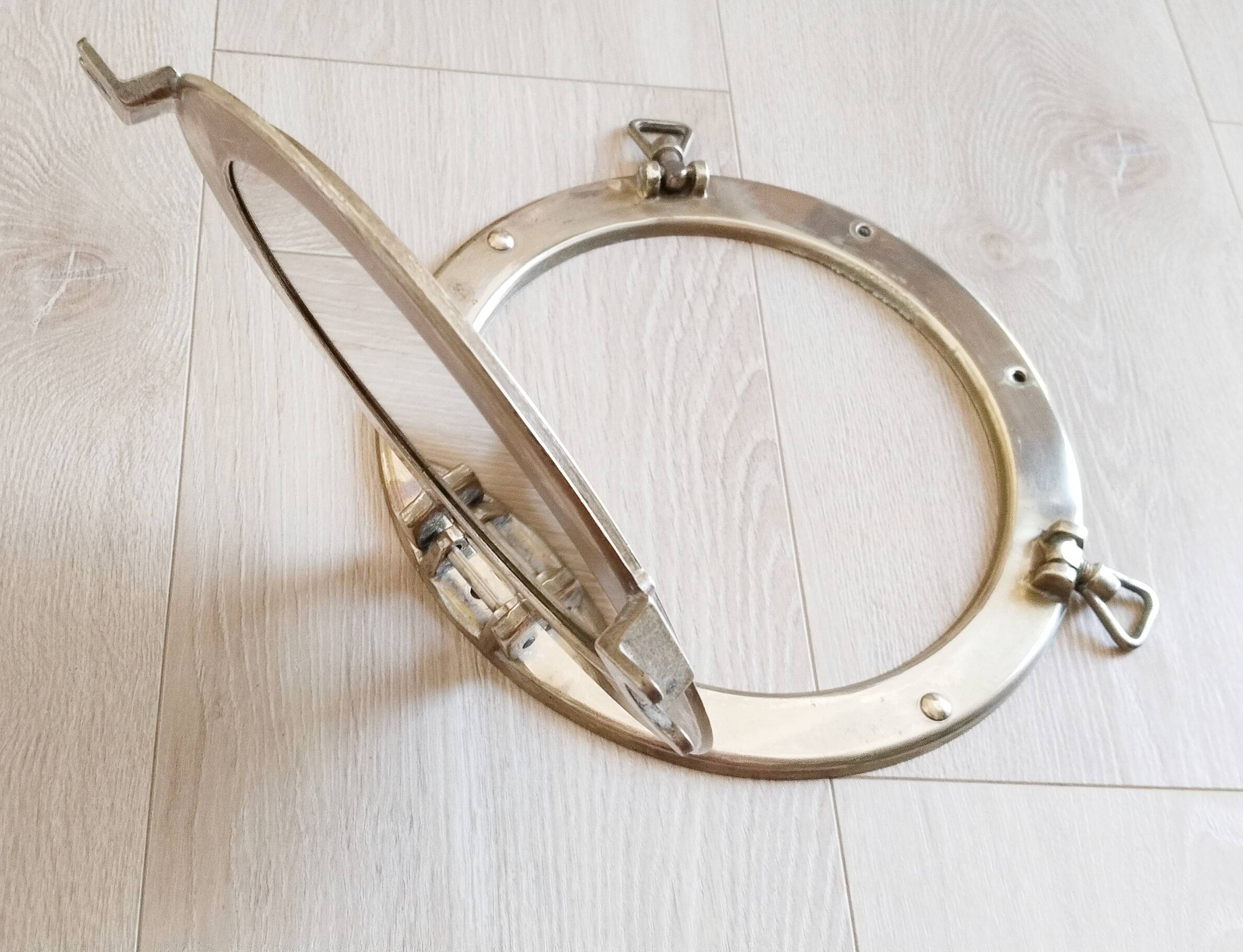 Porthole mirror in gilded brass, marine mirror