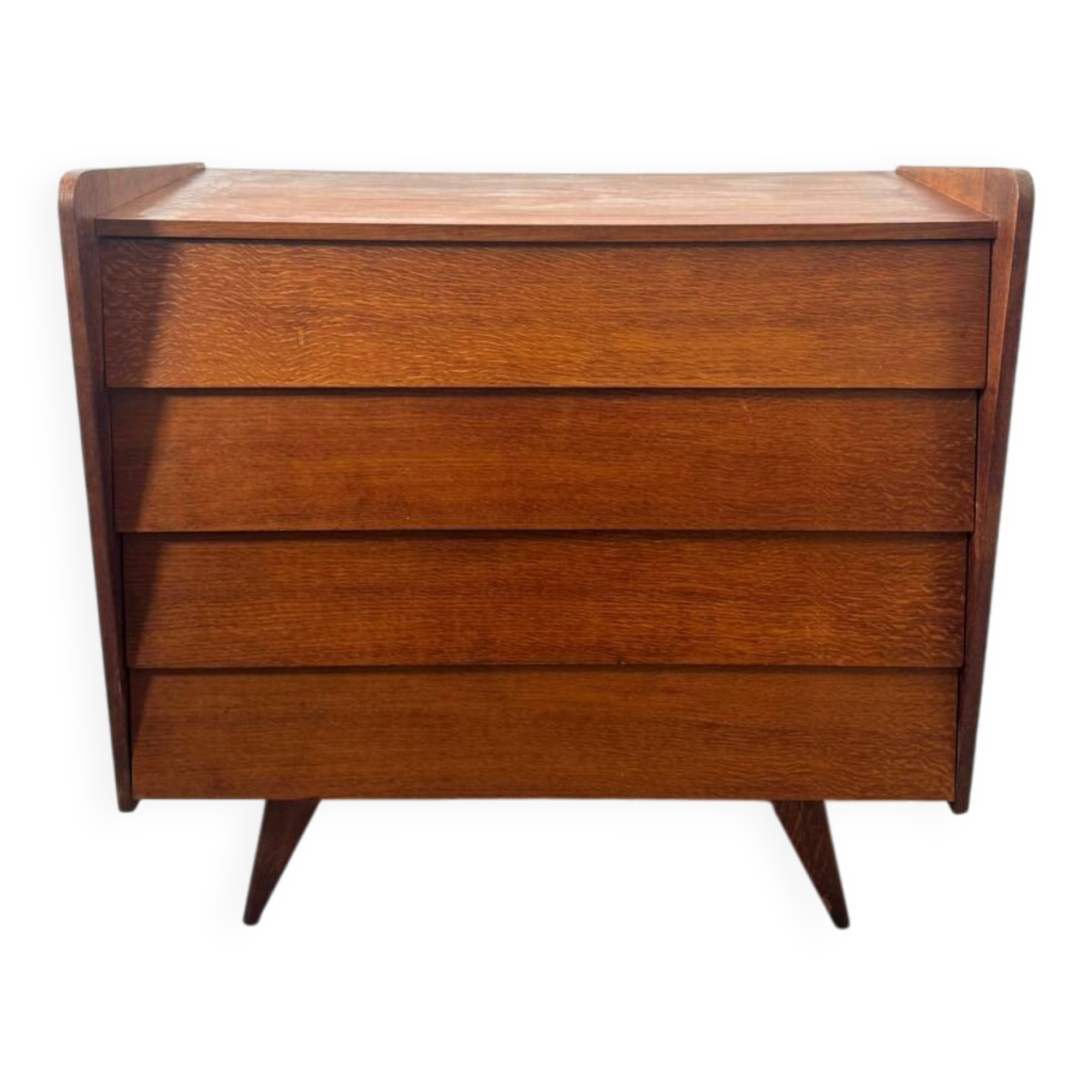 Vintage wooden chest of drawers with tapered legs.