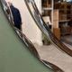 1970s Italian oval mirror by Crystal Arte with faceted glass frame