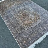 Hand-knotted Persian silk rug