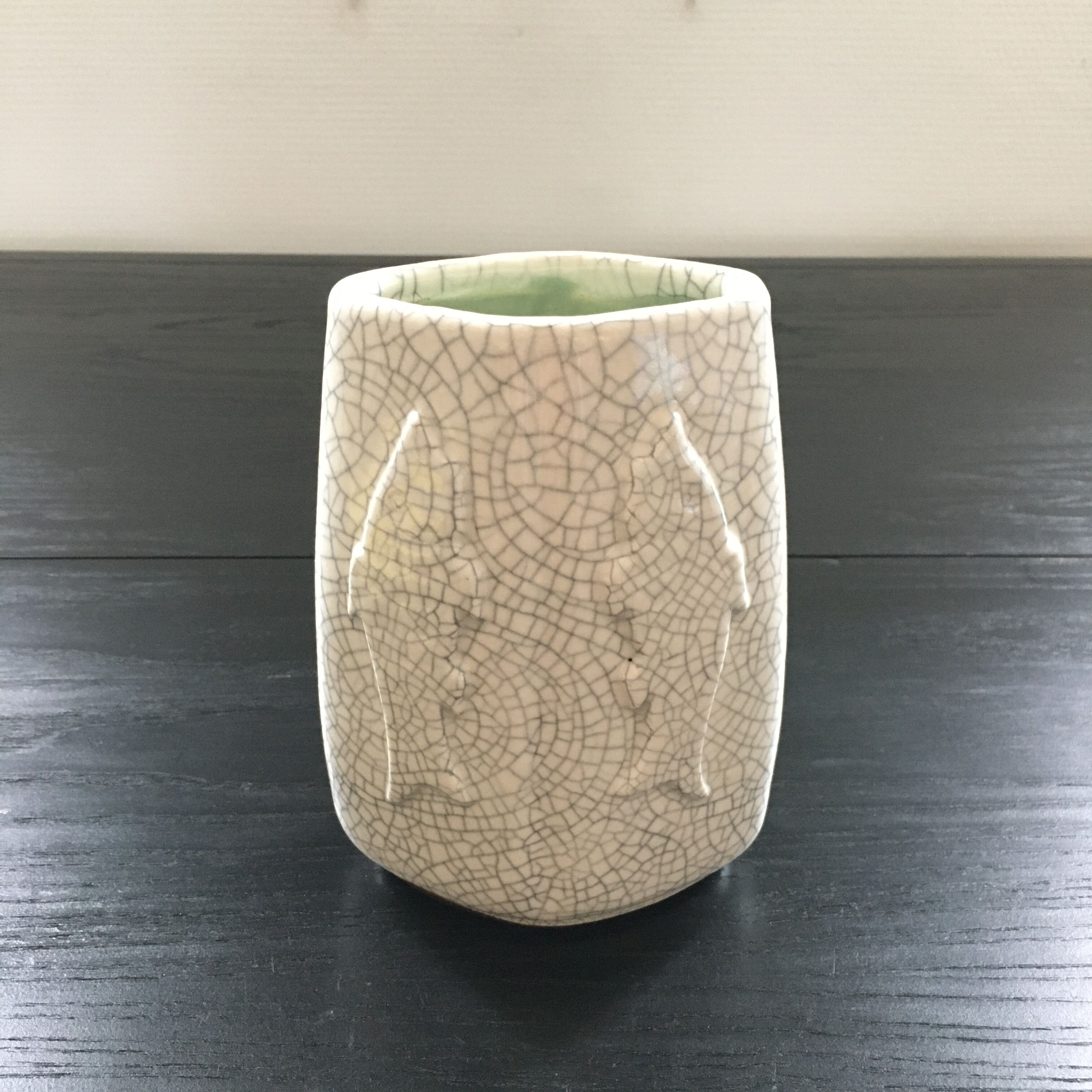 Raku vase with fish and seahorse decoration