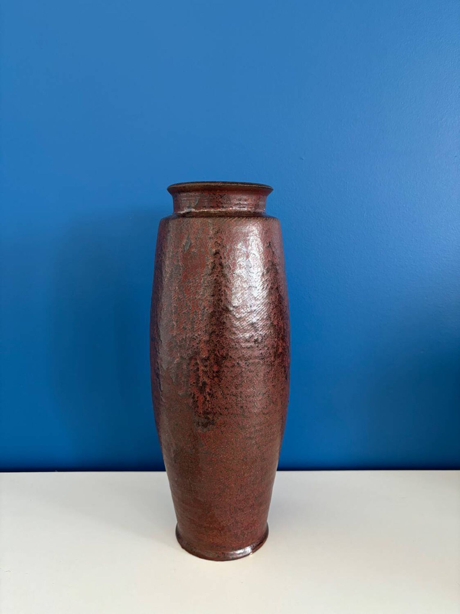 Large textured dark ceramic vase