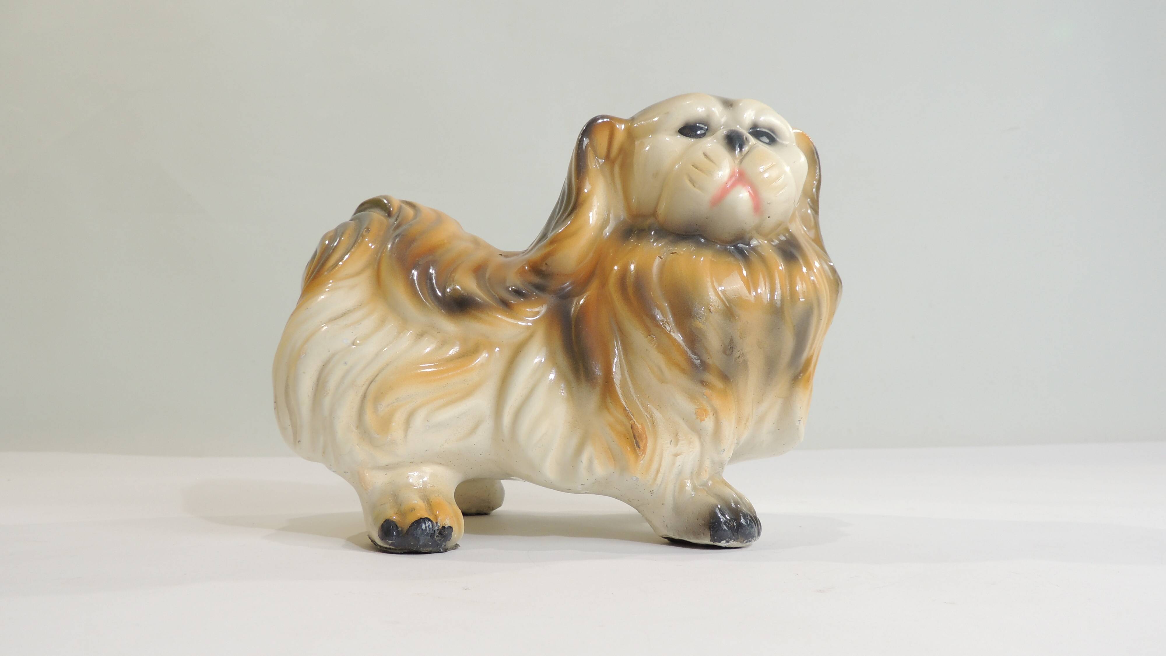Vintage 1970s ceramic Pekingese dog, decorative figurine, statue.