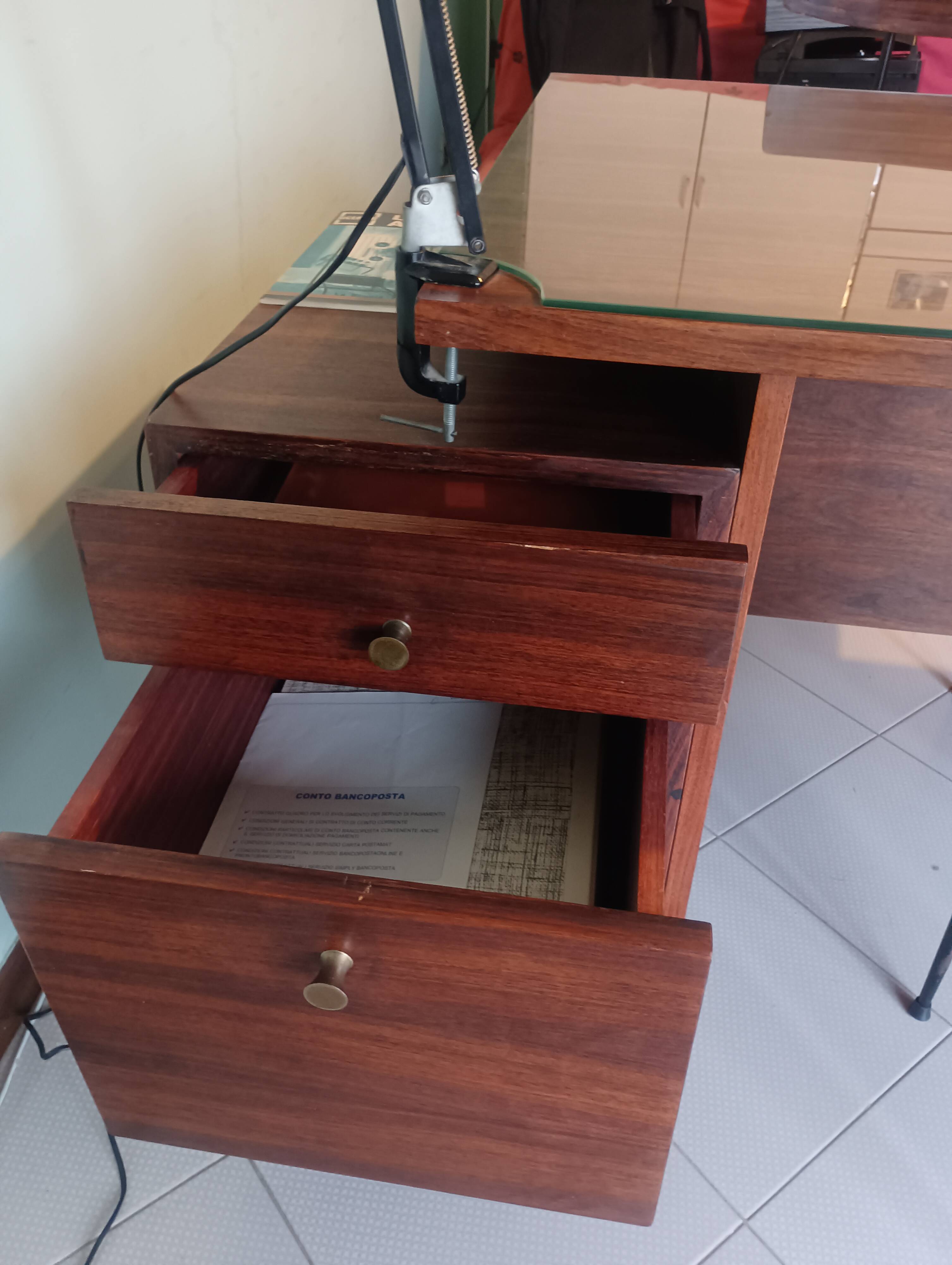 Desk and 3 chairs in 1950s Italian modernist style in rosewood.