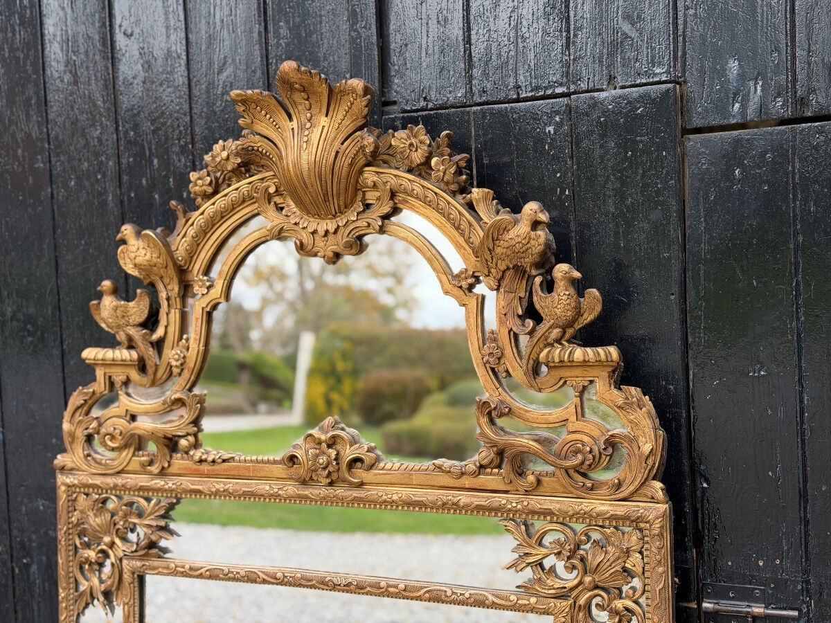 Regency style mirror in gilded wood, 19th century