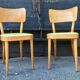 Paire de chaises Baumann en bois et skaÏ jaune vintage