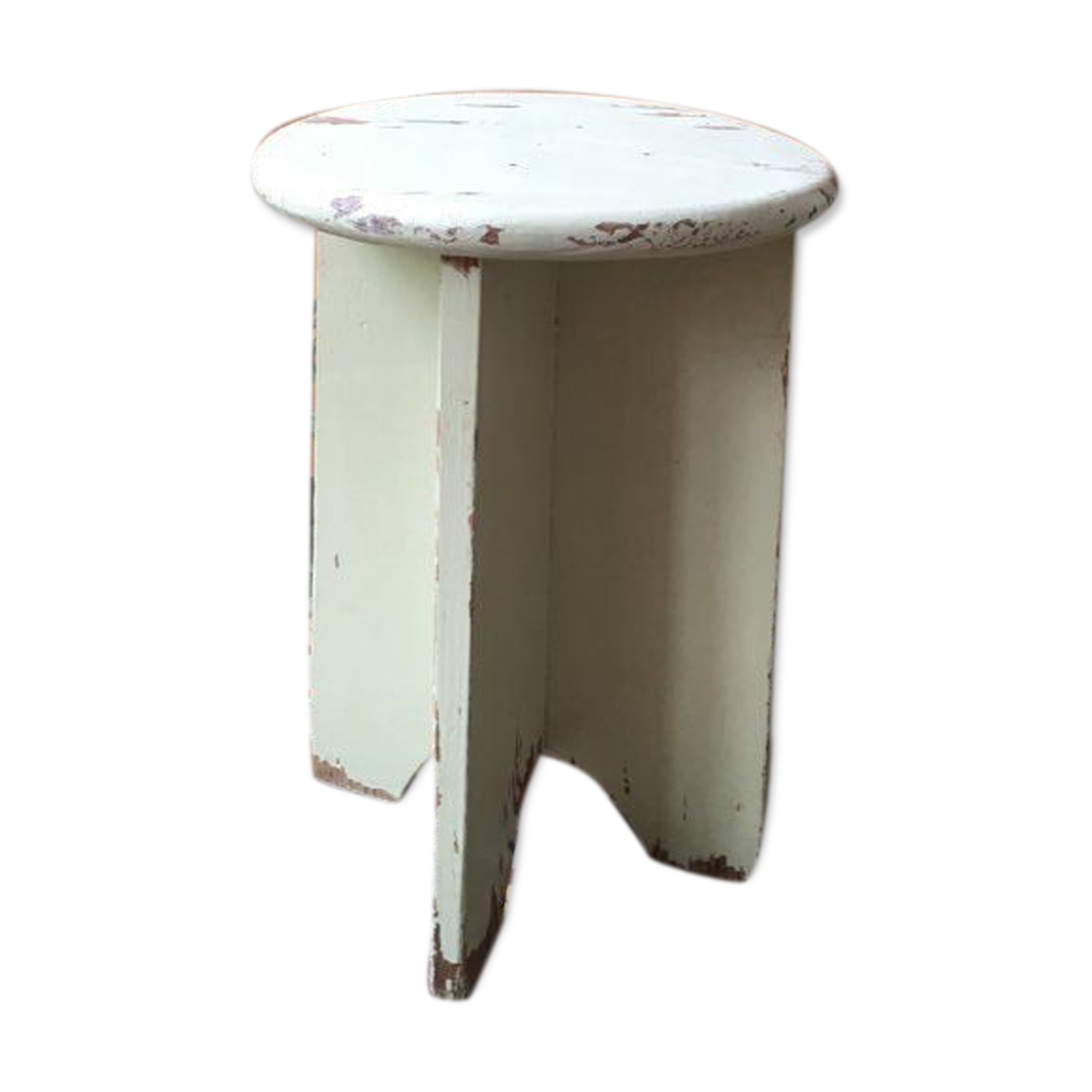 A rough wooden stool patinated by time