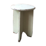 A rough wooden stool patinated by time