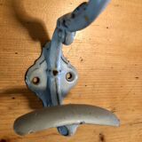 Enamelled cast iron coat hook