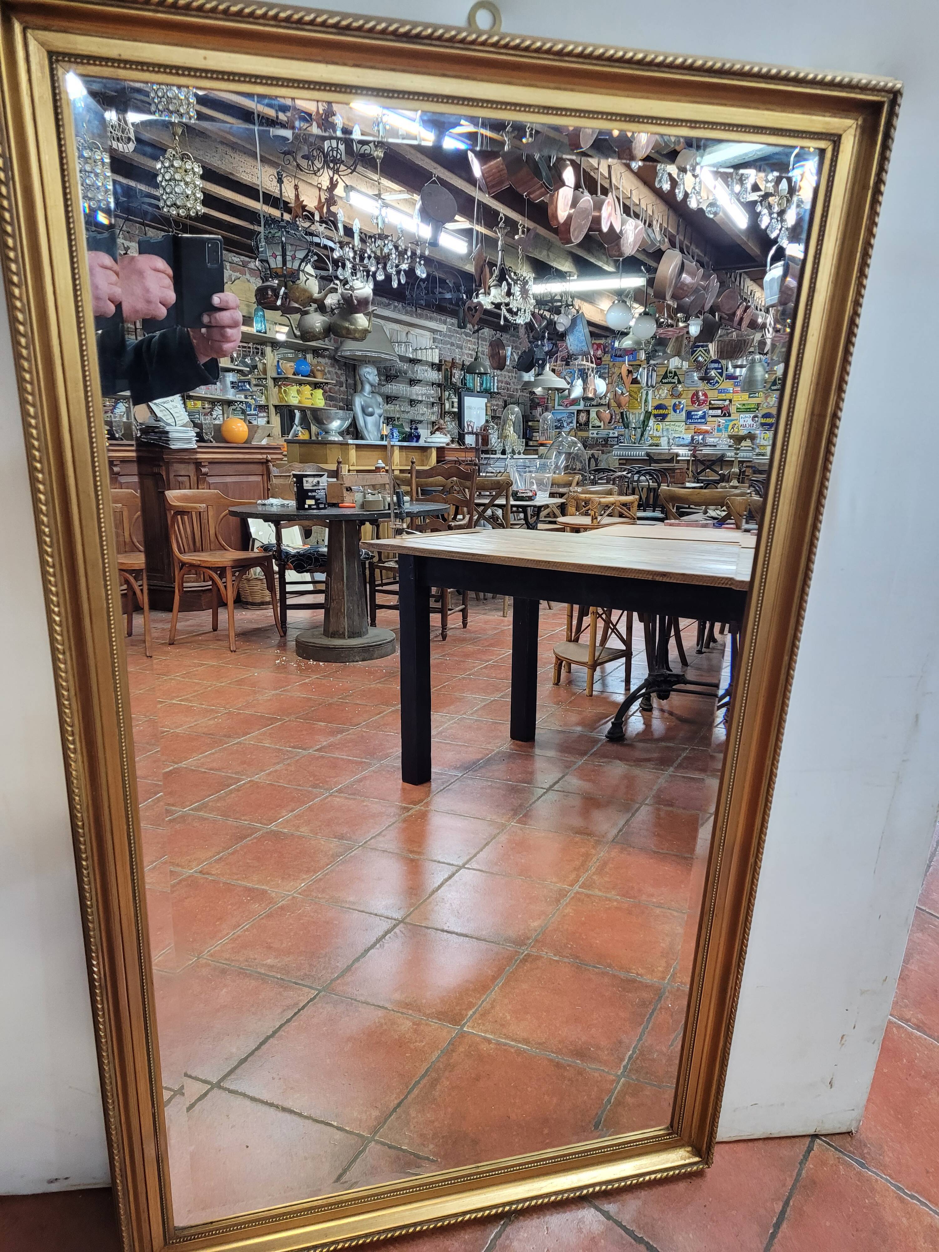 Gilded mirror with beveled mirror