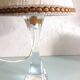 Bedside lamp with glass base and beige fabric lampshade / vintage 60s-70s