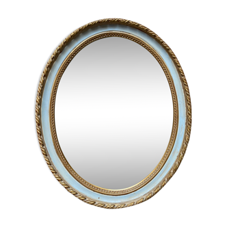 Golden oval mirror with leaf 46x56cm