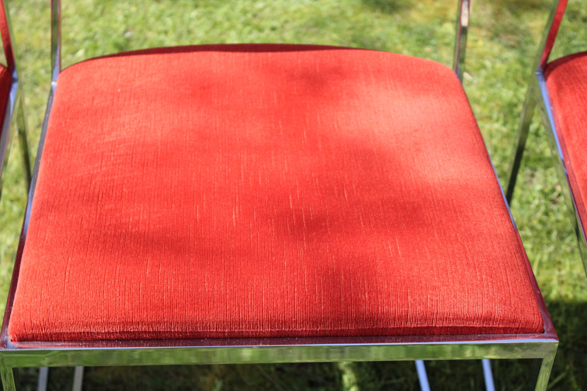 4 Chrome chairs in vintage orange velvet