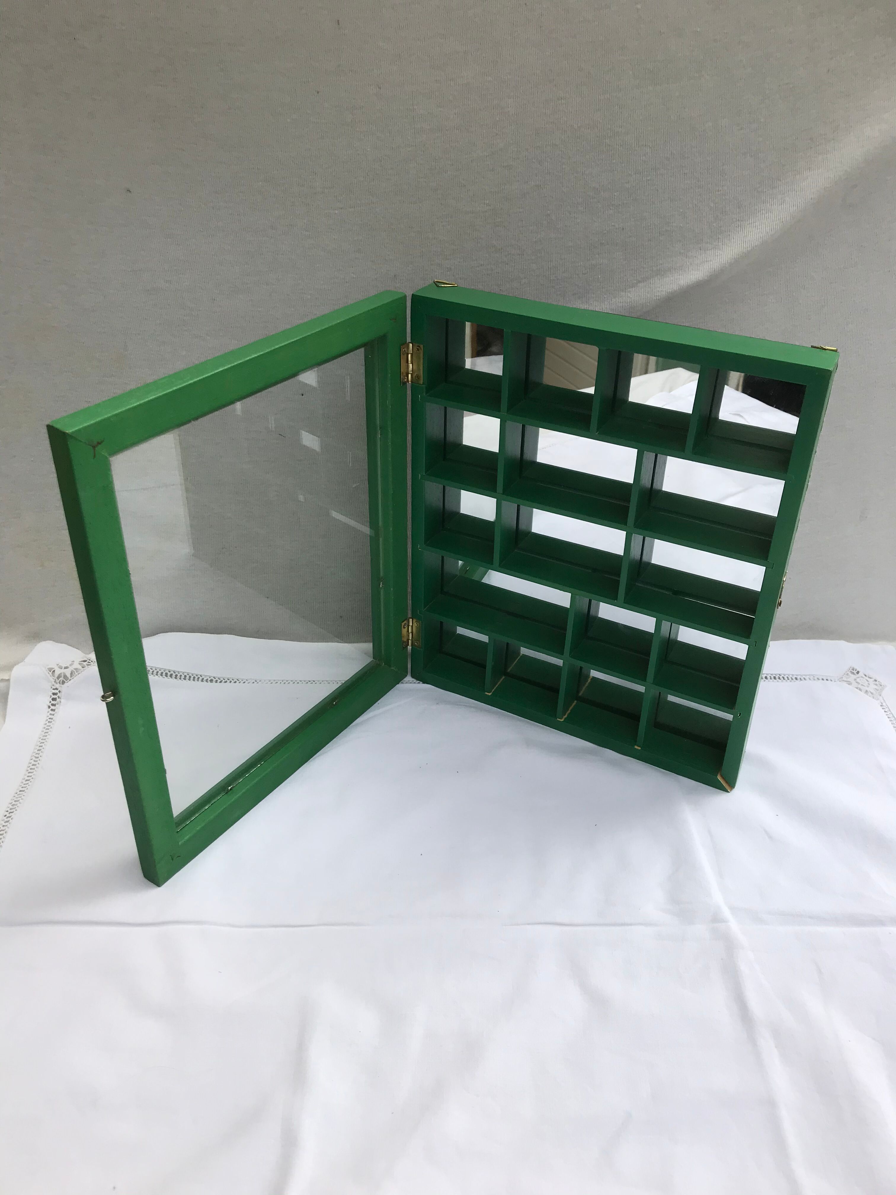 Old green wood showcase