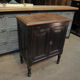 1930s Oak furniture with 2 black patinated doors.