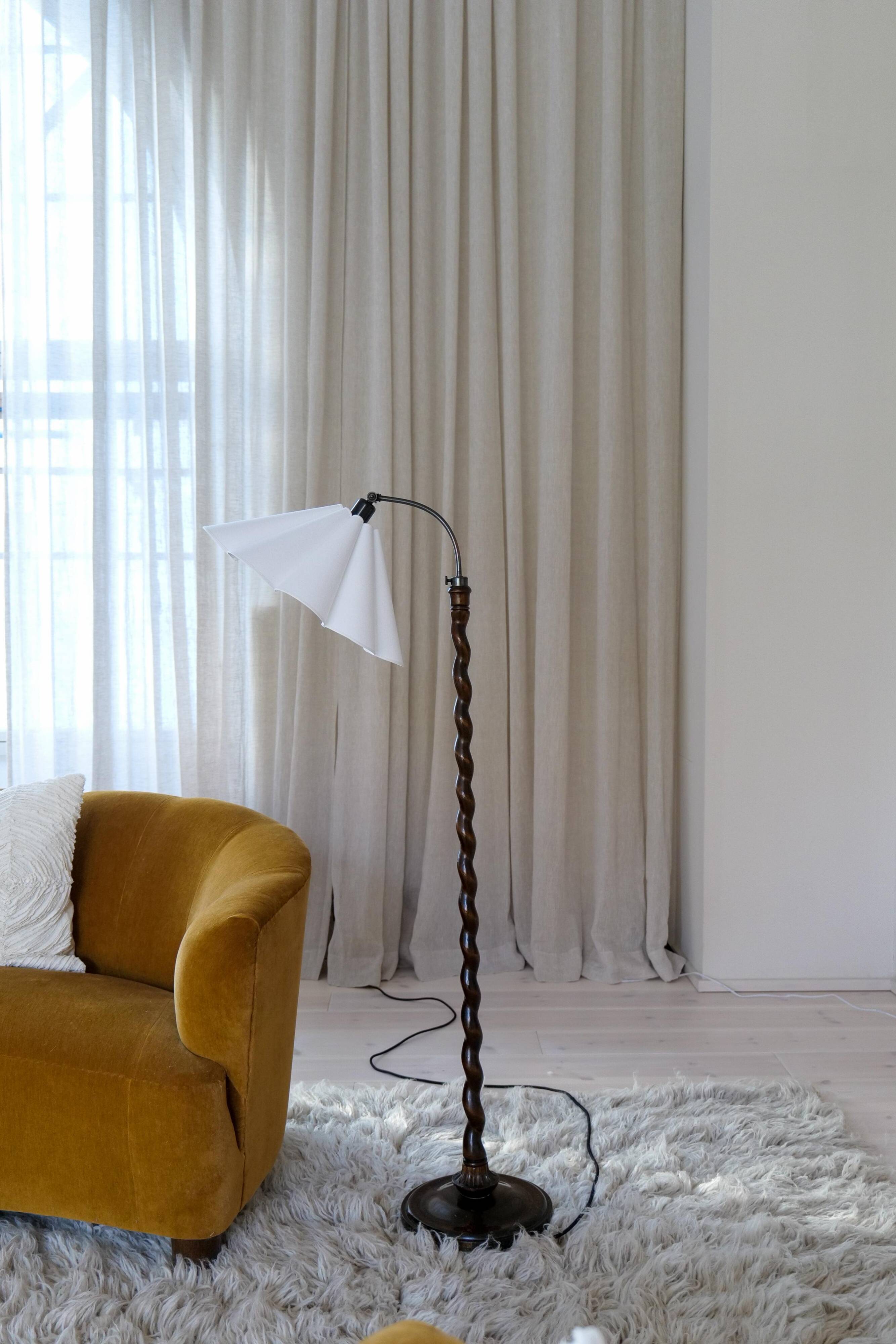 Organic whirlwind floor lamp in stained birch, Sweden, 1940s.