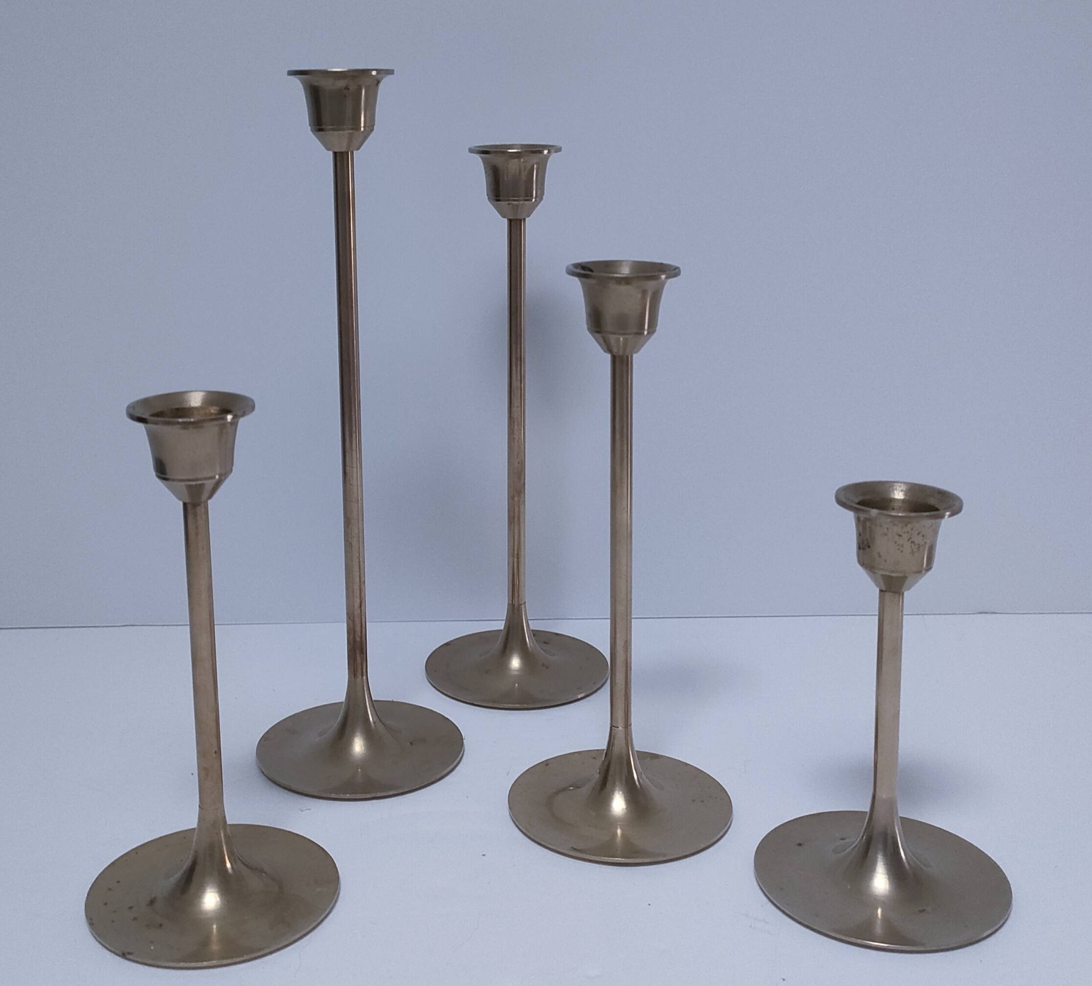 Five vintage Scandinavian design brass candlesticks