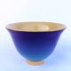 Blue glazed stoneware bowl on a foot, signed SP, Puisaye.