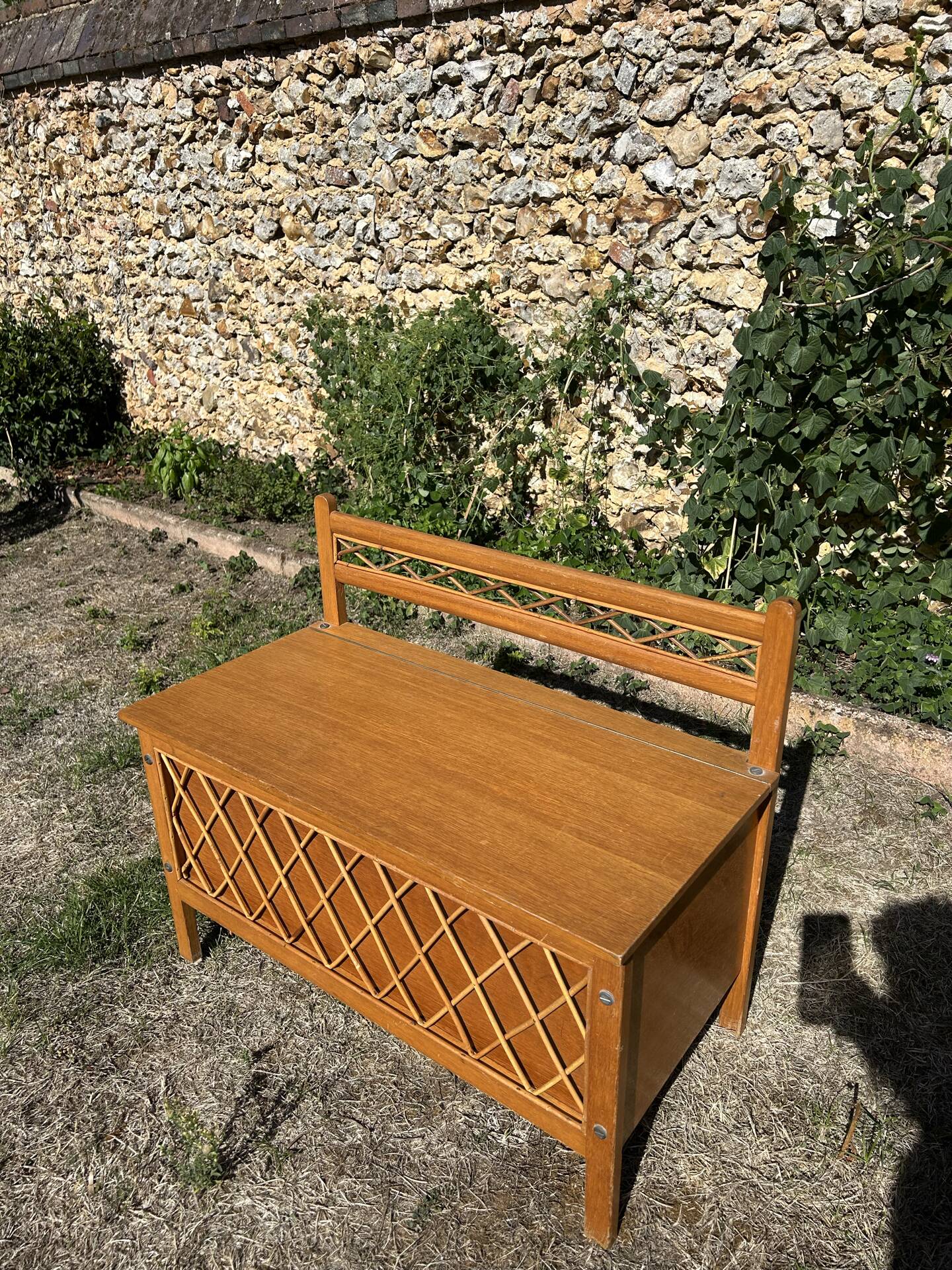 Vintage 1960s bank chest in light oak and rattan weaving.
