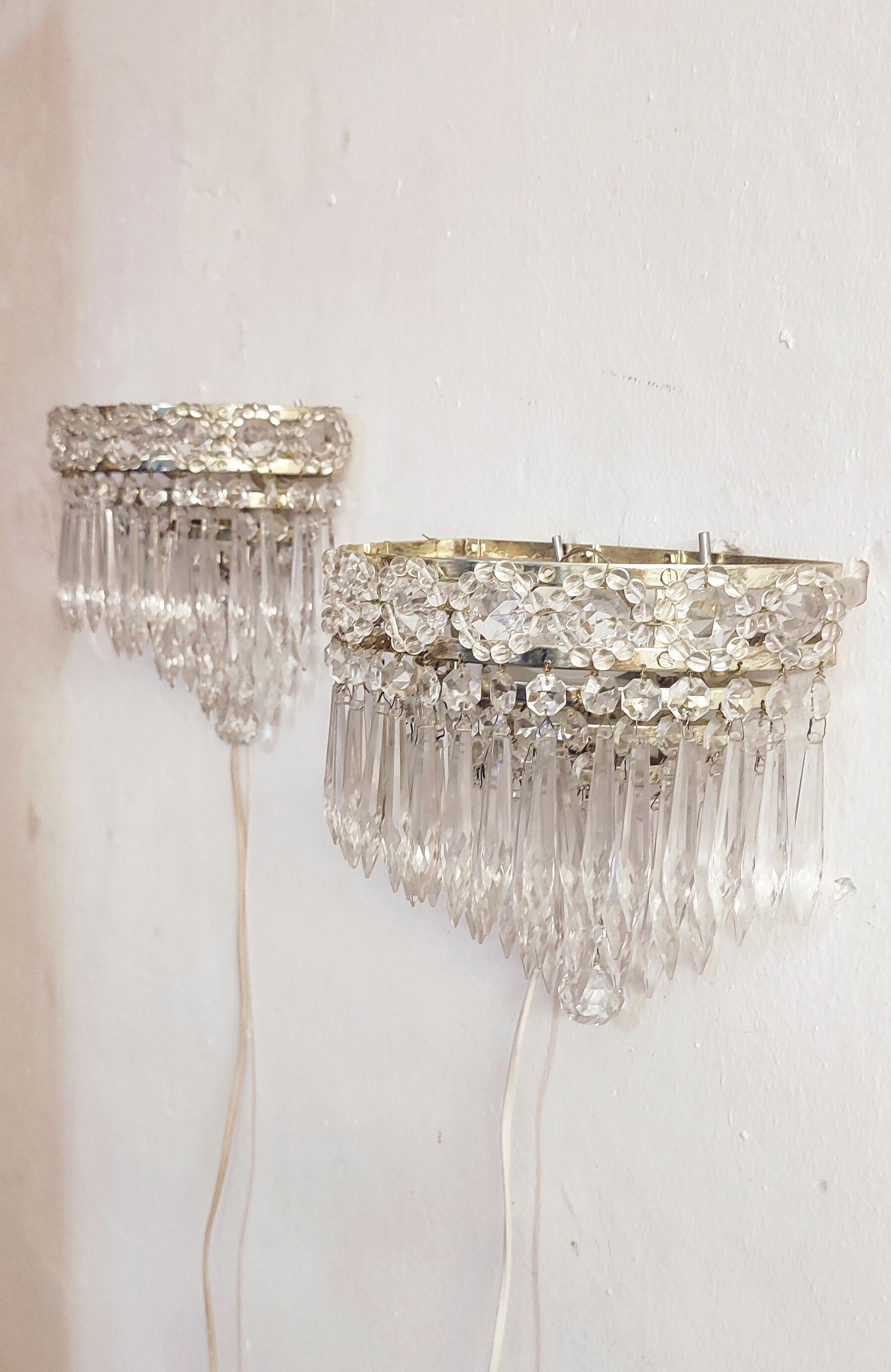 Classic crystal sconces. France, 1950s