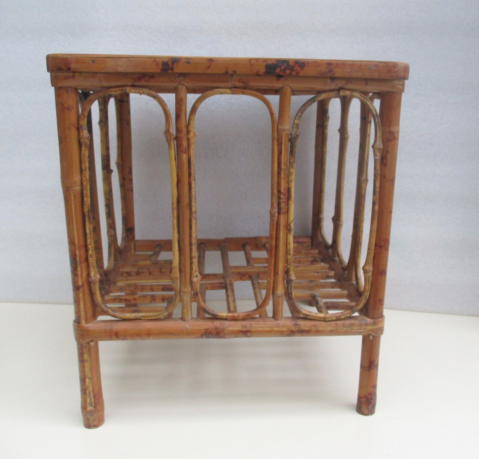 Vintage bamboo coffee table. Marquetry top