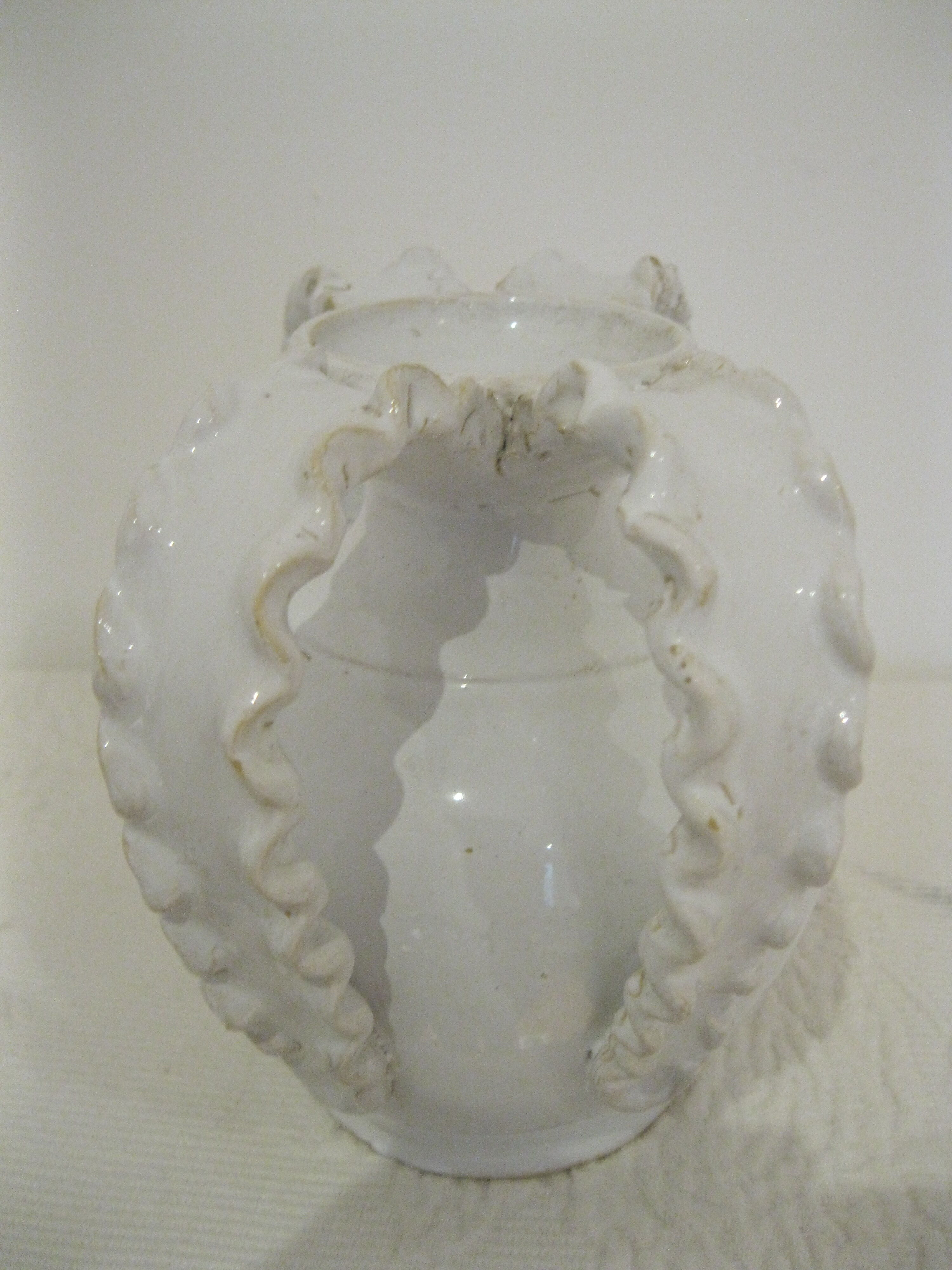 White vase with 4 coves