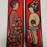 Long Søholm relief in beautiful red glaze with a motif of a girl and a boy